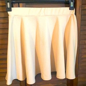 Cream colored mini skirt